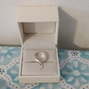 Sterling Silver Band With A Dangling Heart